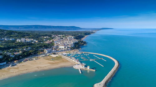 High angle view of sea against blue sky