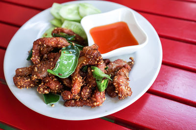 Close-up of food served on table