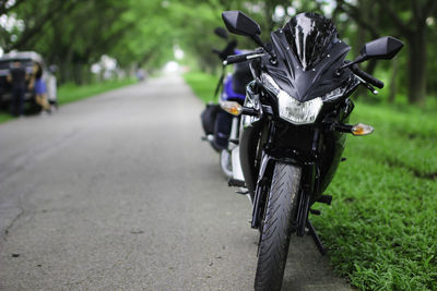Close-up of bicycle on street