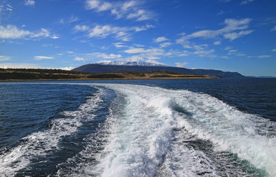 Foaming water at the stern of cruise ship cruising the beagle channel, ushuaia, argentina