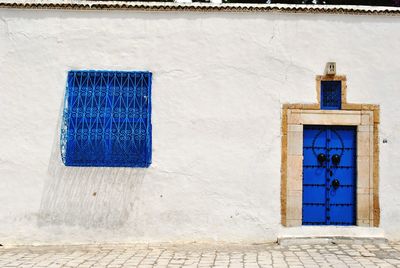 Blue closed door of building