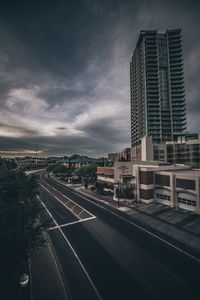 View of city against cloudy sky