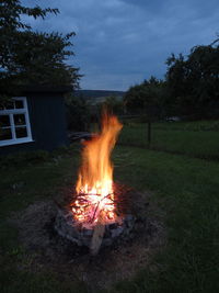 Bonfire in field at night