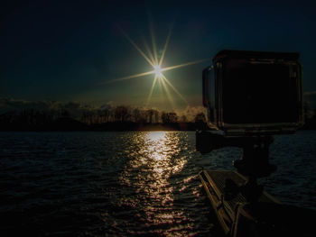 Scenic view of sunset over river