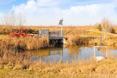 Water pump against sky