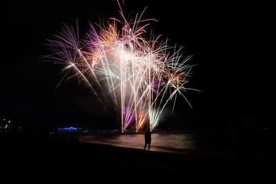 Firework display at night