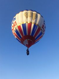 Low angle view of hot air balloon against clear sky