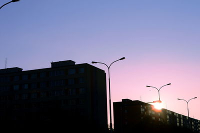 Low angle view of buildings against clear sky