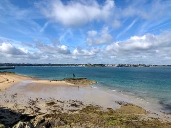 Scenic view of beach against sky