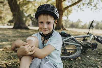 Portrait of boy standing outdoors