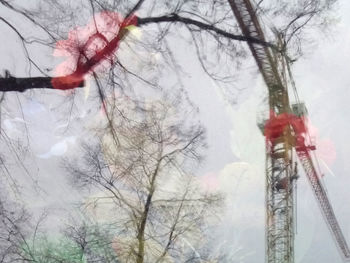 Low angle view of ferris wheel in winter