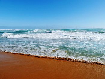 Scenic view of sea against clear sky