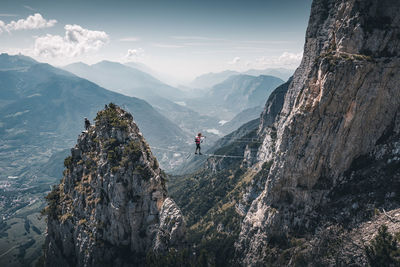 Panoramic view of rocks and mountains against sky