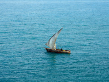 Typical african sailboat in a sea.