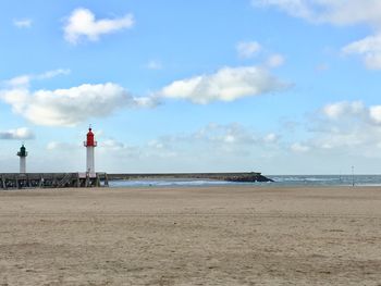 Scenic view of beach against sky