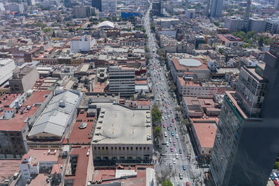 High angle view of street amidst buildings in city