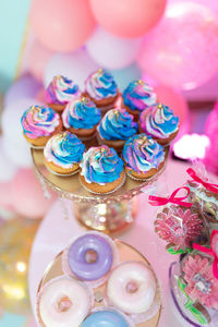 High angle view of multi colored candies on table