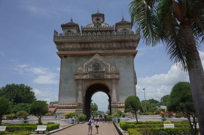 People in front of historical building