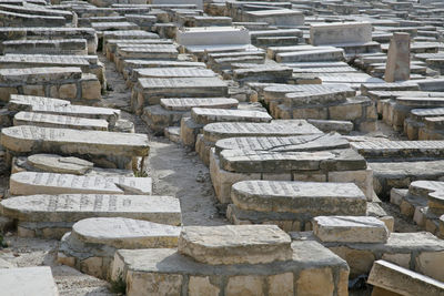 Tombstones in jewish cemetery on sunny day