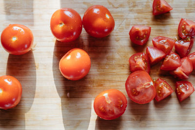 High angle view of chopped tomatoes on cutting board