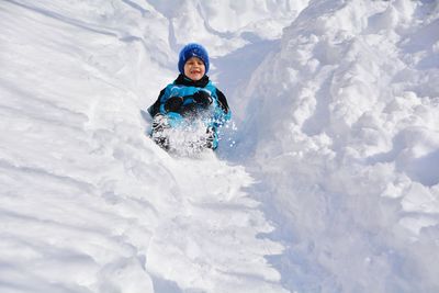 Full length of boy in snow