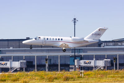 Airplane flying against clear sky