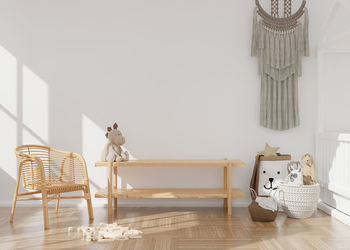 Empty white wall in modern child room. mock up interior in scandinavian, boho style. copy space 