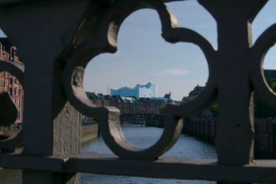 View of buildings and bridge in city