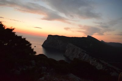 Scenic view of mountains at sunset