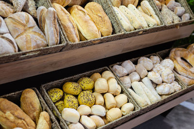 Assortment of various types of italian bread in a bakery.