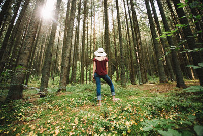 Young woman in forest