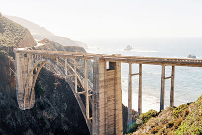 Bridge over sea against sky, bixby creek bridge, shot on film