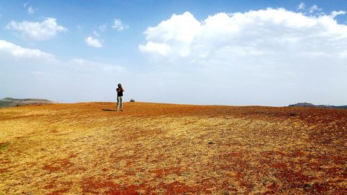 Woman standing on landscape