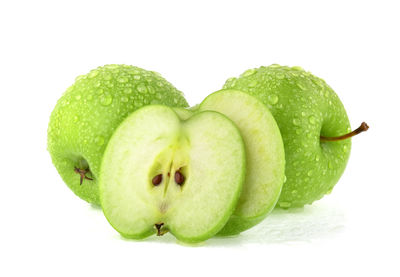 Close-up of apple against white background