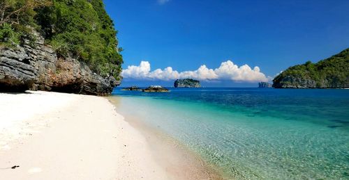 View of beach against blue sky