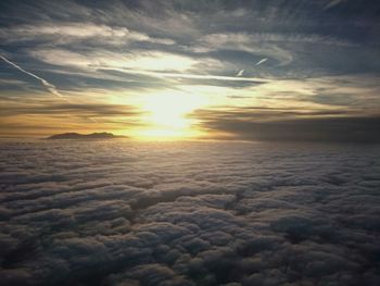 Scenic view of sea against cloudy sky