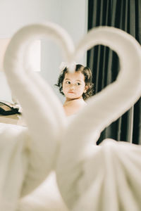 Portrait of beautiful woman standing in bathroom