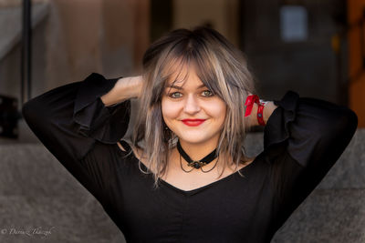 Portrait of smiling young woman