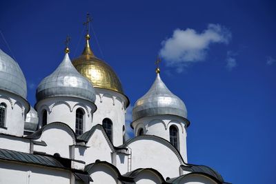 Low angle view of building against blue sky