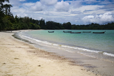 Scenic view of beach against sky