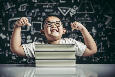 Portrait of boy with text in background