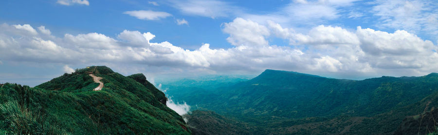 Panoramic view of mountains against sky