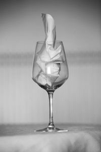 Close-up of wineglass on table