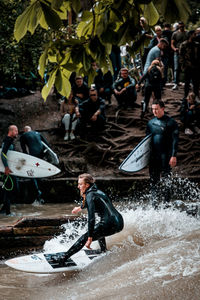 Group of people enjoying in water