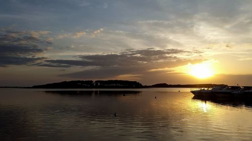 Scenic view of sunset over sea