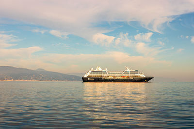 Ship in sea against sky