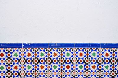 Half-tiled colourful wall