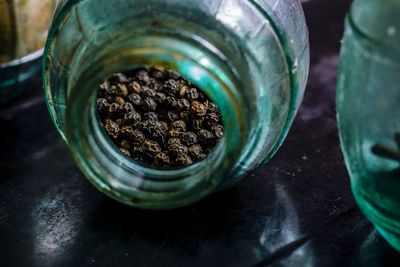 Close-up of spices in jar on table