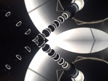 Low angle view of illuminated electric lamp