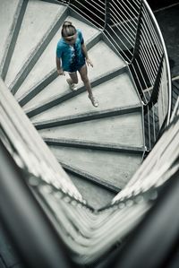 High angle view of boy on steps